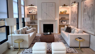 Hero image of a living room featuring the Clint Sofas and Classic Charm Ottoman, styled with soft tones and layered textures for a warm, inviting atmosphere.