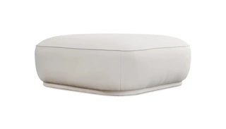 Enzo ottoman in soft fabric with rounded form