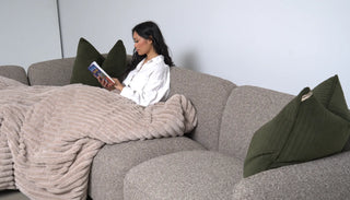 “Hug Me” sofa in dark textured fabric