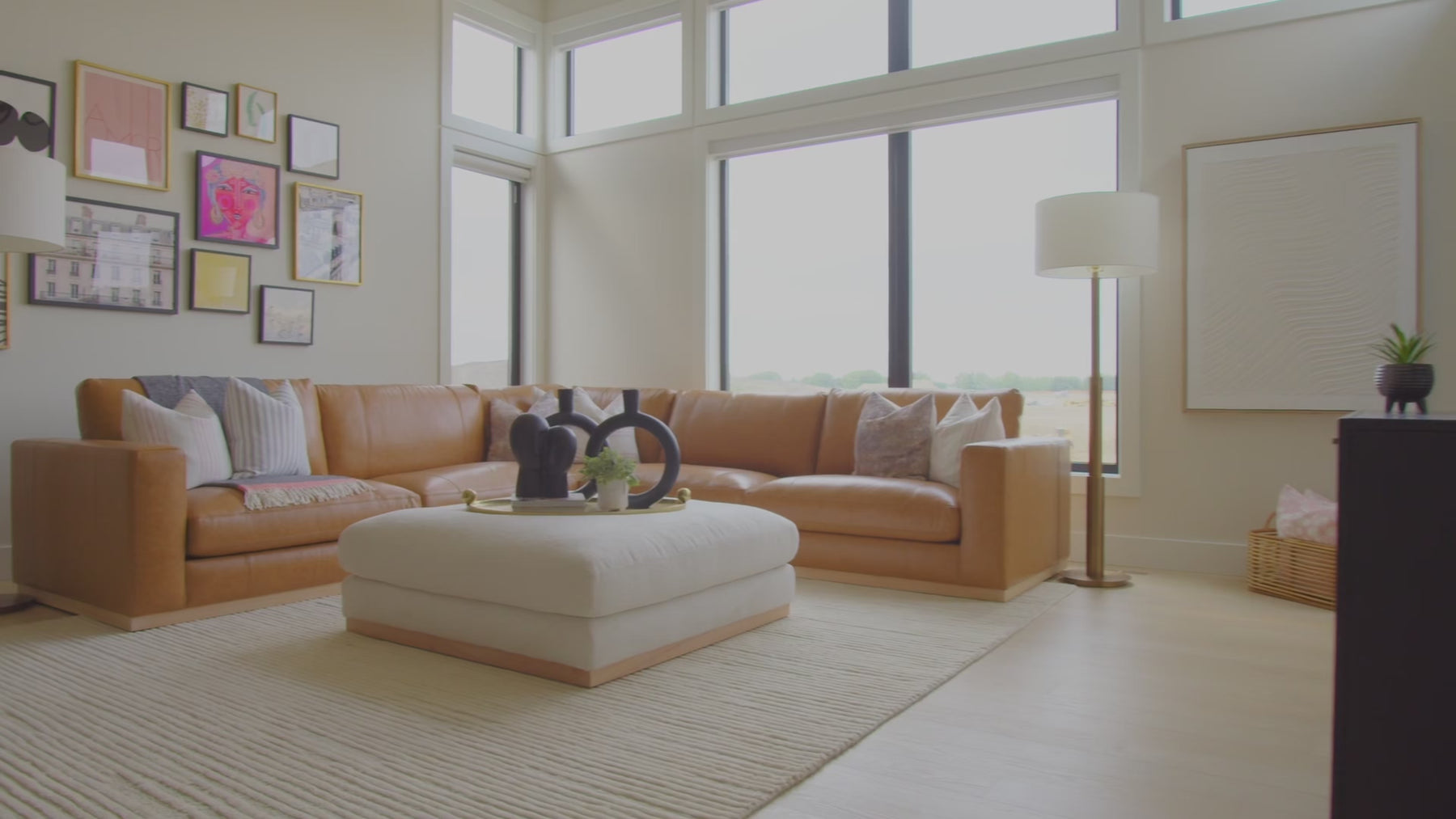Video showing the Prague Sectional Sofa in a modern living space, highlighting its clean lines, spacious seating, and soft upholstery in a neutral tone.
